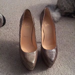 Christian LouBoutin snakeskin high heel pumps